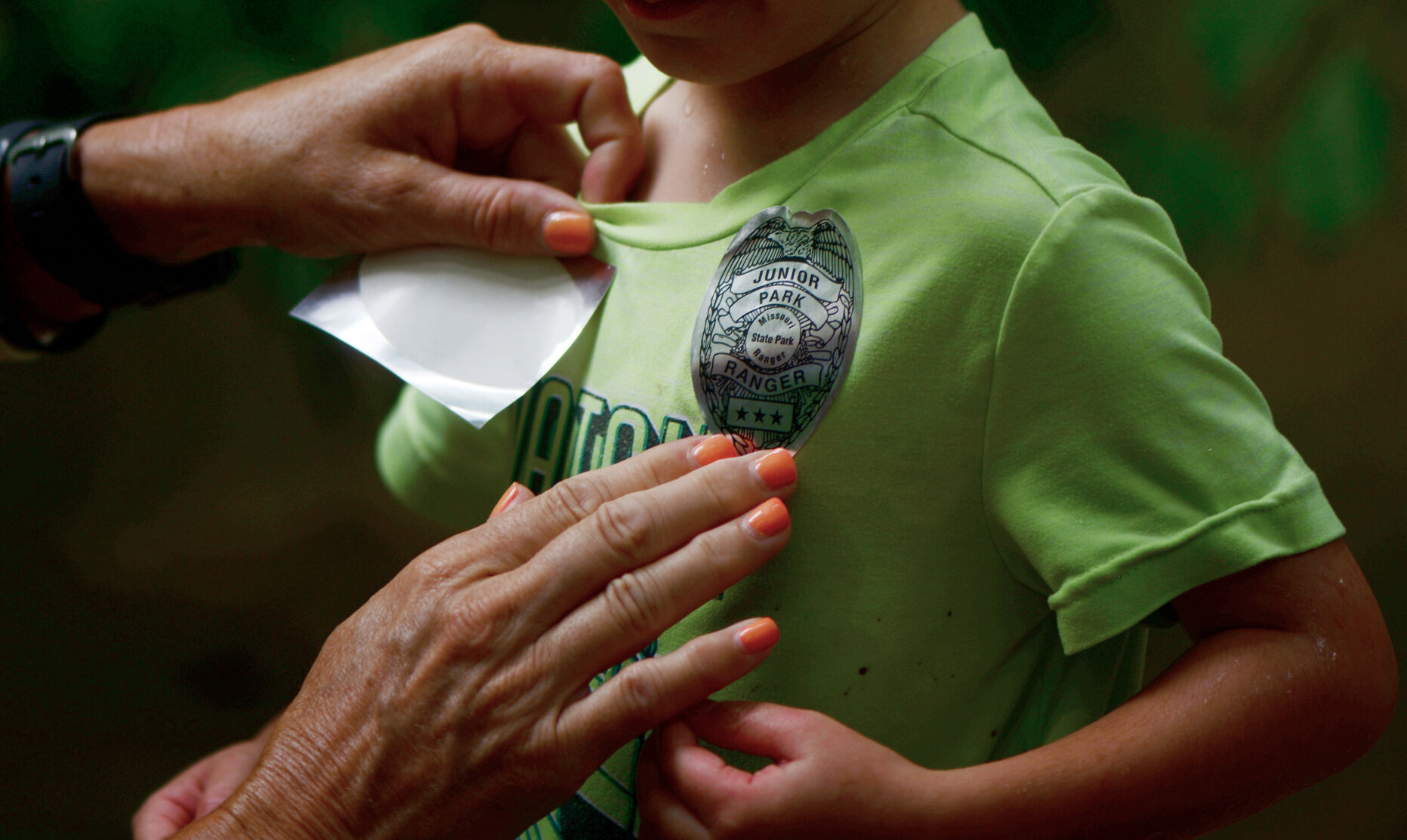 Gary Cockerham receives a junior ranger sticker
